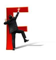 man climbing the letter f